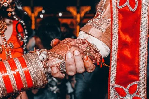 Close up of Indian couple's hands at a wedding Stock Photos
