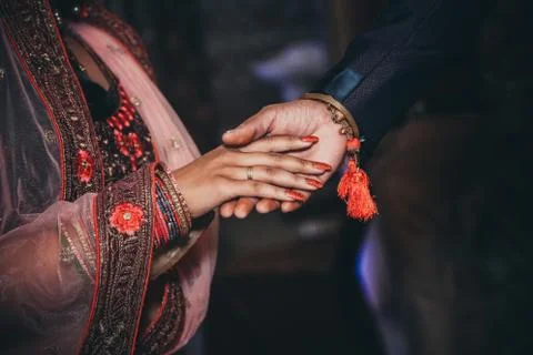 Close up of Indian couple's hands at a wedding Stock Photos