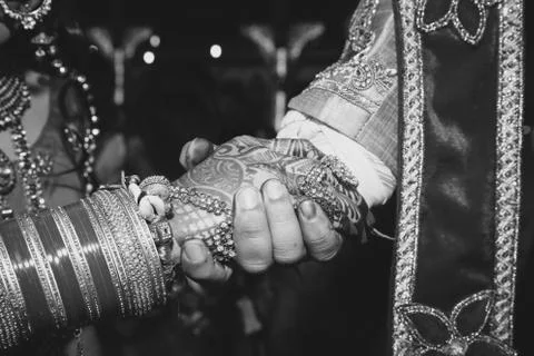 Close up of Indian couple's hands at a wedding Stock Photos