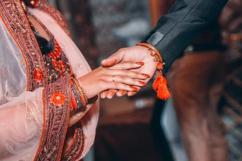 Close up of Indian couple's hands at a wedding Stock Photos