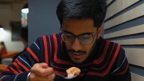 Close-up, Indian Guy Dines at Cafe Stock Footage 101650032