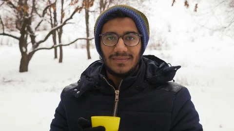 Close-up, Indian Guy Is Drinking Hot Coffee In Winter In The Forest Stock Footage 101559862
