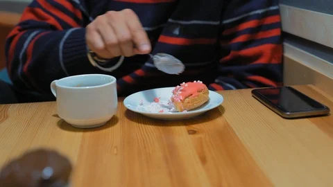 Close-up, Indian Guy Eats Cream Cake at Cafe Stock Footage 101648990