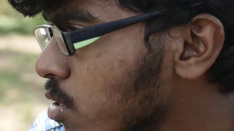 Close up of indian man with glasses Stock Footage 59823784