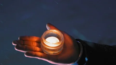 Close-up of Indian Man's Hand with Candle Stock Footage 101669863