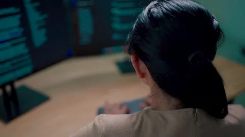 Close-up of an Indian working on a desktop computer in a startup office.  Stock Footage 270288233