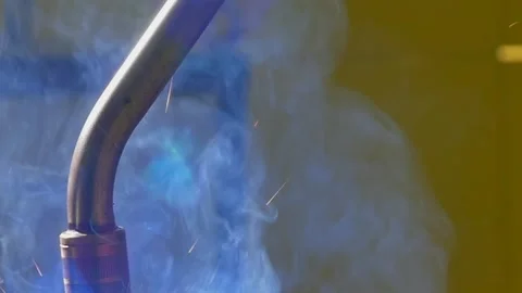 Close-up of Industrial Argon Welding Robot Creating Sparks in Slow Motion Stock Footage 341068452