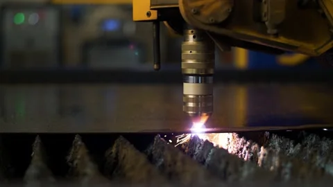 Close up of industrial CNC machine laser cutting steel in metal factory. Stock Footage 170942603