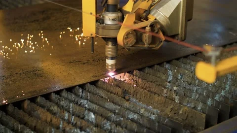 Close up of industrial CNC machine laser cutting steel in metal factory. Stock Footage 170942794
