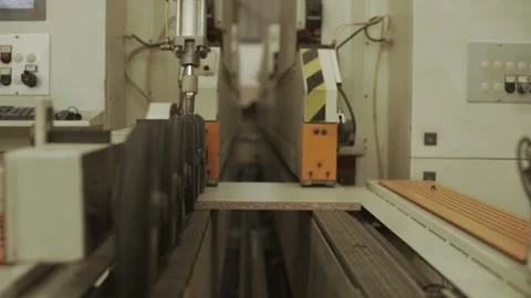 Close up industrial machine line work with melamine in factory Stock Footage 151873492