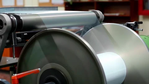 Close Up of Industrial Machine With Rotating Drum and Rollers Stock Footage 333781928