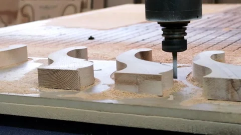 Close-up of an industrial milling machine to process a wooden detail. Stock Footage 233486973