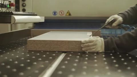 Close up industrial operator work with melamine plank in factory Stock Footage 151873209
