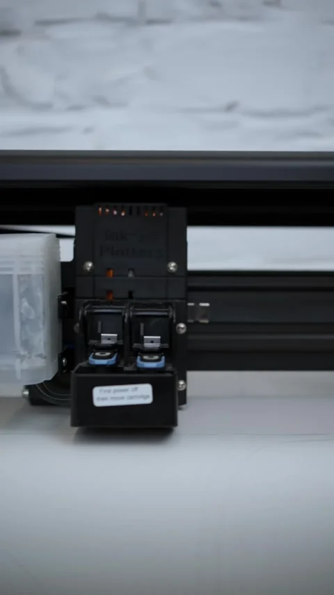 Close-up of industrial plotter in action. Concept industrial printer. Stock Footage 290507666