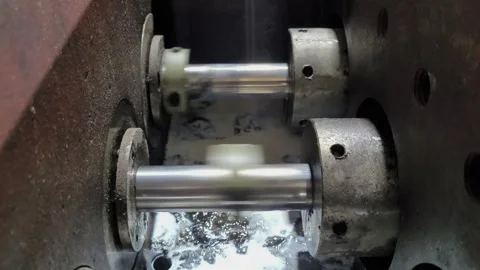 Close-up of Industrial Pump Piston Rods in Reciprocating Motion with Lubricant Stock Footage 331722164