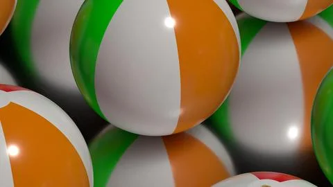 Close-up of inflatable beach ball on green and orange background Stock Illustration
