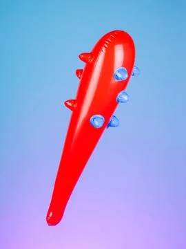 Close-up of an inflatable stick with a spiked inflatable club on a purple bac Stock Photos