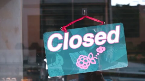 Close-up information plate closed hand door. Stopping the restaurant COVID-19. Video stock 142148405