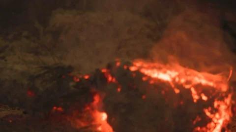 Close up of ingot being covered in dry grass to add carbon to steel. Traditional 스톡 동영상 125433370