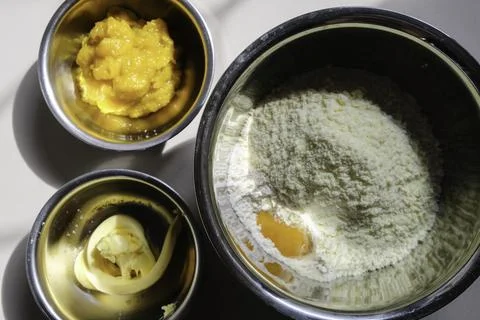 Close-up of ingredients for making pumpkin donuts. Stock Photos