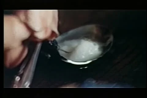 Close-up of injecting narcotics into arm Stock Footage 11353872