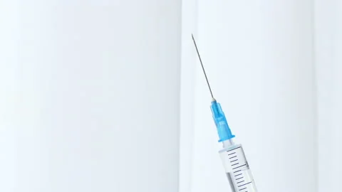 Close Up of injection liquid being in syringe. Medication drug needle syringe Stock Footage 174741709