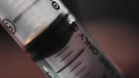 Close up of injection syringe liquid Stock-Footage 345860669