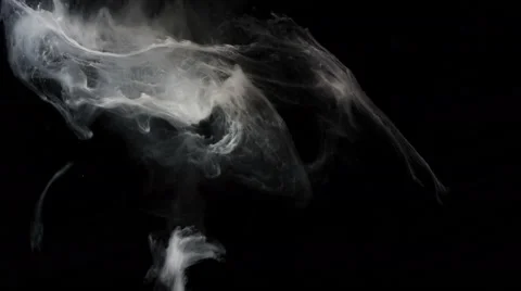 Close up of ink floating like smoke in slow motion on black background, 4K Stock Footage 67368505