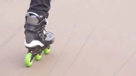 Close Up of inline skates with green wheels Stock Footage 120445594