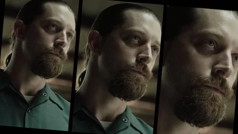 Close-up of an inmate with a determined expression, 2000s, USA - Reenactment Stock Footage 243734780