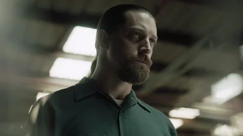 Close-up of an inmate with a determined expression, 2000s, USA - Reenactment Stock Footage 243735236