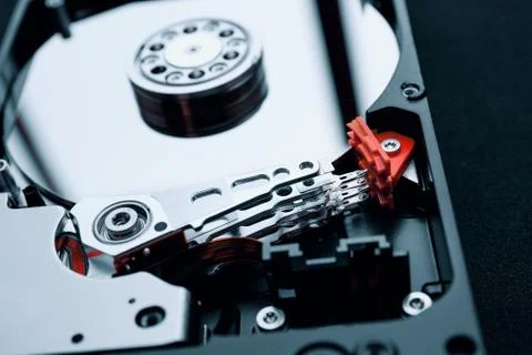 Close-up inside assembly hard disk drive, arm and platters Stock Photos