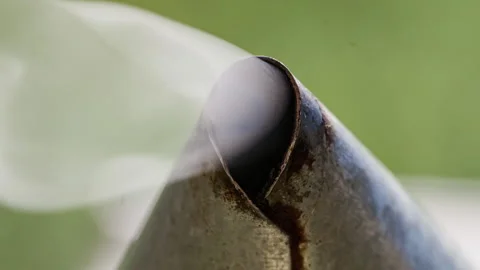 Close-up inside bee smoker nozzle with rising smoke Stock Footage 345088513