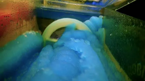 Close up inside Blue Iced Slush machine Stock Footage 12082711