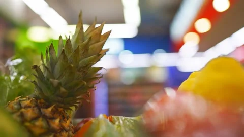 Close-up inside the cart where there are various healthy foods and fruits. The Stock Footage 239230262