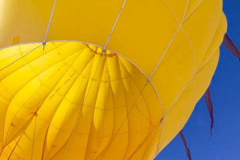 Close up of inside of colourful yellow hot air balloon Stock Photos