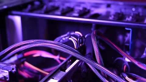 Close up inside computer case with glowing purple lights illuminating inter.. Stock Footage 339412963