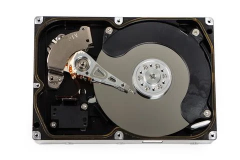 Close up inside of computer hard disk drive HDD isolated on white background Stock Photos