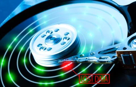 Close up inside of hard disk drive. Detail of writing/reading head on acuator Stock Photos