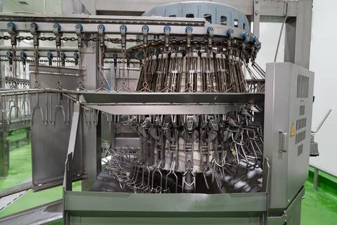 Close  up inside poultry ass drilling machine Stock Photos