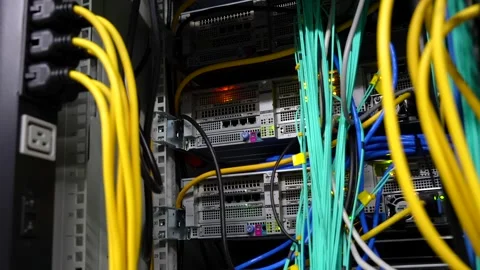Close Up Inside Server Cabinet with Blinking Lights, Network Cables, and Ac.. Stock Footage 341700625