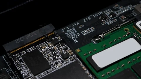 Close-Up Inspection of Circuit Board Component Integration in a Tech Laboratory Stock Footage 272967289