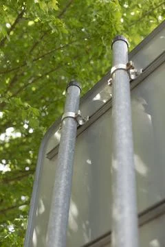 Close inspection of pole tops with structural features and weather effects 스톡 사진