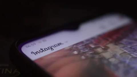 Close-up instagram social network app scroll. scrolling photo on instagram. Stock Footage 228904386