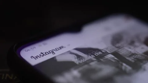 Close-up instagram social network app scroll. scrolling photo on instagram. Stock Footage 228916499