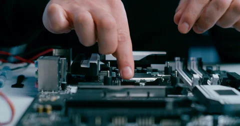 Close up of Installing CPU MicroProcessor into PC Motherboard with Thermal Paste Stock Footage 158454300