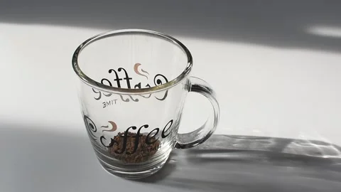 Close-up of instant coffee granules poured into a cup. Brewing instant coffee. Stock Footage 304077863
