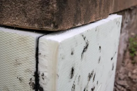 Close-up of insulation of foundations with foam boards, improvement of ener.. Foto stock