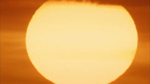 Close up on intense shimmering sunset over Florida coast Stock Footage 136147371