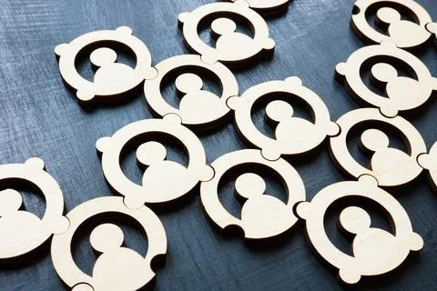 Close up of interconnected figures. Community and teamwork. Stock Photos